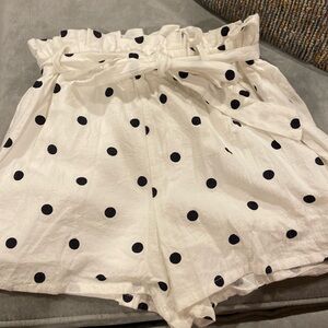 Black polka dot white shorts